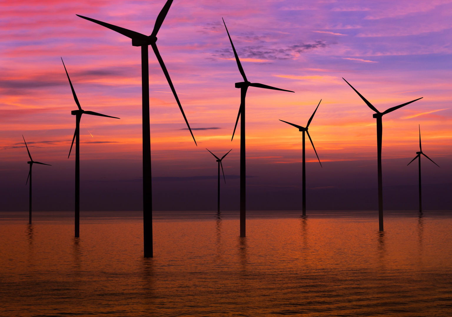 Wind turbine farm in beautiful nature landscape.